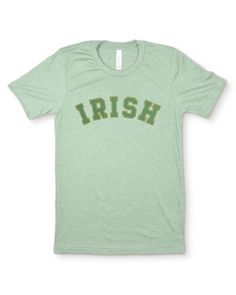 A simple & modern St Patricks Day graphic tee for women or men, perfect for celebrating the Irish holiday or giving as a St Patricks gift for a wife, sister or friend. Features a minimalistic green and yellow gold arched "IRISH" text design printed on our cozy heather sage green gender neutral crew neck tee. Made from quality, buttery-soft airlume cotton that provides all day comfort, breathability & durability. ☑ 52% airlume cotton + 48% polyester☑ Buttery-soft, light-weight & breathable materi Irish Tshirts, Lucky Shirt, Graphic Tops, Tees For Women, Text Design, Crew Neck Tee, Soft Light, St Patricks, Celebration Of Life