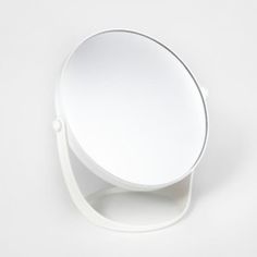 a white round object sitting on top of a table