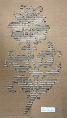 a piece of cardboard with an intricate design on it