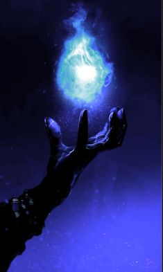 a hand reaching up towards a glowing object