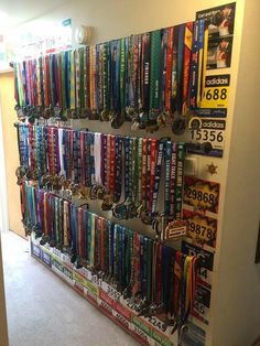 there are many medals hanging on the wall