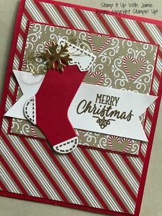 a close up of a christmas card with a stocking ornament on it