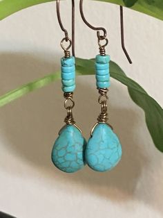 "12x15mm Blue turquoise magnesite stone teardrop, bronze tone 2\" long dangling earrings. Hand made Jewelry. All purchase will arrive in gift boxes Thanks for stopping by!" Adjustable Blue Bohemian Teardrop Earrings, Blue Wire Wrapped Bohemian Teardrop Earrings, Blue Bohemian Teardrop Earrings With Wire Wrapped, Bohemian Blue Wire Wrapped Teardrop Earrings, Turquoise Wire Wrapped Teardrop Dangle Earrings, Blue Bohemian Teardrop Earrings Nickel Free, Bohemian Turquoise Teardrop Drop Earrings, Turquoise Bohemian Teardrop Earrings, Nickel-free Turquoise Teardrop Earrings