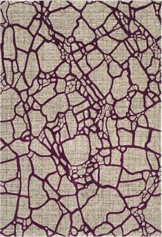 an abstract pattern in beige and purple on fabric with dark red lines that appear to be cracked