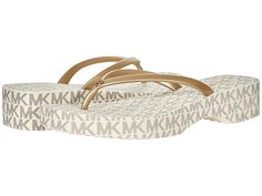 MICHAEL Michael Kors Lilo Flip-Flop - Women's Shoes : Vanilla/Pale Gold : The MICHAEL Michael Kors Lilo Flip-Flop are casual comfort meets upscale fashion. Round-toe slip-on platform wedge thong sandals. Branding medallion on strap. Synthetic upper and lining. Synthetic insole and outsole. Imported. Measurements: Heel Height: 1 1 2 in Weight: 7 oz Product measurements were taken using size 8, width M. Please note that measurements may vary by size. Weight of footwear is based on a single item, n Flip Flops Michael Kors, Upscale Fashion, Pale Gold, Wide Boots, Platform Wedge, Thong Sandals, Platform Wedges, Flip Flop, Women's Shoes