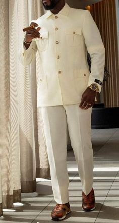 This elegant African men's outfit is specially designed to make you look unique among others in all occasion. our cloths are made with quality fabric, great sewing, neat finishing and the price is affordable. The cloths are of different colors you can choose any color of your choice. Please contact us to make you look unique in all event. Mens Wedding Suits, Formal Attire For Men, Mens Wear Wedding, African Wear Styles For Men, African Attire For Men, African Shirts For Men, African Shirts, Fashion Suits For Men, Mens Fashion Classy