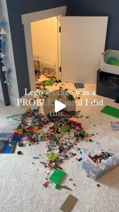 a room filled with lots of toys and clutter on top of carpeted floor