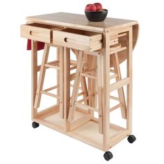 a wooden table with two stools on it's legs and one drawer at the top