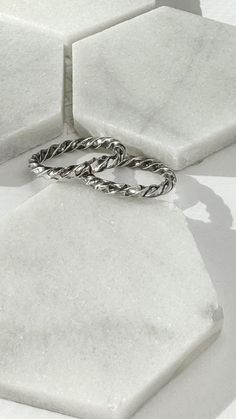 Handmade sterling silver stacking rings make a beautiful addition to any ring stack or worn alone. Adjustable Midi Rings With A Modern Twist For Gifts, Modern Twist Adjustable Midi Rings As Gift, Adjustable Sterling Silver Midi Rings With A Modern Twist, Adjustable Silver Midi Rings With Modern Twist, Modern Twist Adjustable Sterling Silver Midi Rings, Adjustable Spiral Midi Rings In Silver, Everyday Jewelry With Modern Twisted Style, Adjustable Spiral Silver Midi Rings, Adjustable Silver Spiral Midi Rings