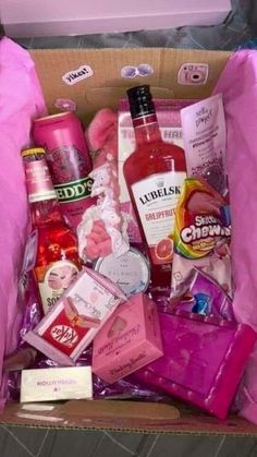 a pink box filled with lots of different items