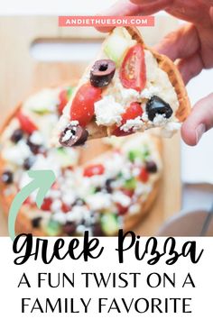 a person holding a slice of pizza with the words greek pizza on it and an image of