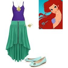 the little mermaid dress is next to a pair of shoes