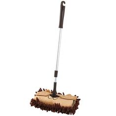 a mop with a brown handle is shown on a white background