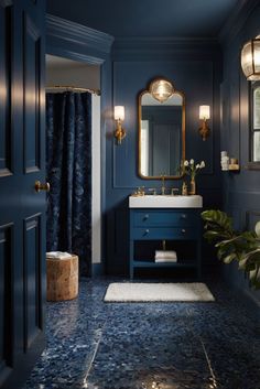 a bathroom with blue walls and marble floors