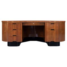 an art deco desk with three drawers