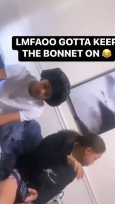 two young men standing next to each other in front of a tv screen with the caption lmfao gota keep the bonet on