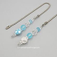 two necklaces with blue and clear beads