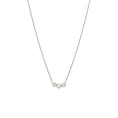 14k gold 3 graduated white diamond necklace with a white opal in the middle SPECIFICS • 14k tiny cable chain with spring ring closure • Total chain length: 16" (14"+ (2) 1" extenders) • curved bar is approx. ⅜" wide• white diamonds 0.06 ctw White Diamond Necklace, Bezel Necklace, Curved Bar, Zoe Chicco, Bezel Diamond, Ring Size Guide, Gold Chain Necklace, White Opal, White Diamonds