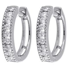 Color, sparkle and style combine to form these amazing diamond hoop / huggie earrings. Crafted in precious 10K white gold, these huggie earrings feature a row of shimmering white diamonds. Perfect for any-time wear, these earrings captivate with 1/4 ct. t.w. of genuine white diamonds. Polished to a bright shine, all round cut diamonds are in channel setting, making the overall appearance larger and lustrous. These earrings secure comfortably with snap / hinged closure backing for secure wear. Th Round Diamond Earrings, Modern Jewellery Design, Diamond Huggies, Set Earrings, 18k Gold Jewelry, Fancy Diamonds, Huggie Earrings, Diamond Hoop Earrings, Channel Set