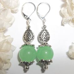 This Adorable Beaded Earring Set Is Brand New & Handmade By Me - Wvluckygirl. Done With Faux Light Jade Green Glass Beads. They Have Antiqued Silver Toned Costume Jewelry Beads. The Pair Dangle & Drop From 925 Sterling Silver Lever Backs For Women's Pierced Ears. Measure 2 Inches Tall & 1/2 Inch Wide. Each Single Earring Weighs 4.7 Grams. You Will Love The Ornate Detail Work On Those Beads. Very Eye Catching And Pretty. Buy Them Before Someone Else Does! Fashion Accessory Rustic Detailed Dangly Elegant Green Hypoallergenic Beaded Earrings, Silver Hypoallergenic Beaded Earrings, Elegant Jade Beaded Earrings With Round Beads, Elegant Jade Beaded Round Earrings, Elegant Beaded Jade Earrings, Elegant Jade Beaded Earrings, Mauve Earrings, Blue Pearl Earrings, Glass Fashion