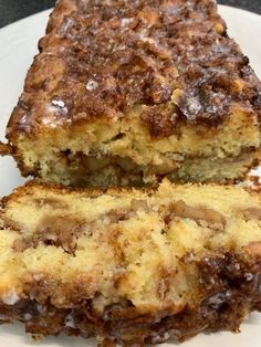 two pieces of cake sitting on top of a white plate