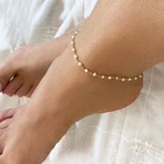 A feet bracelet with genuine pearls and 925 sterling silver that is 24k Gold finished/ You will love to wear it every day! These Tiny pearl gems, add a sparkling shine to your summer look! Ideal for a wedding day as a wedding anklet!❤️️❤️️ 👉Handmade with love in the sunny Greece! Material ✔️Pearl original gemstone ✔️Gold-filled 925 sterling silver >>IS IT A GIFT?❤️️ This dainty anklet comes in a beautiful gift box. If you wish to send a personal message, please name it at the checkout process! Delicate Adjustable Bracelets For Summer, Delicate Adjustable Bracelet For Summer, Delicate Adjustable Summer Bracelets, Minimalist Summer Anklets As A Gift, Minimalist Summer Anklets For Gifts, Minimalist Summer Anklets As Gift, Elegant Adjustable Anklet With Tiny Beads, Handmade Adjustable Delicate Anklets, Handmade Delicate Adjustable Anklets