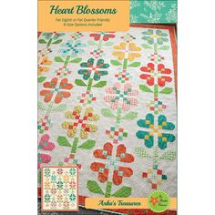 the cover of heart blossoms quilt pattern is shown in green, orange and pink colors