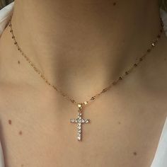 The Angel Necklace 🤍 Featuring a unique gold cross with sparkly CZ crystals and an 18k gold filled chain. tarnish resistant 🖤 each will come with an extender for adjustability! Made with love 🫶 Crystal Cross Chain Jewelry, Crystal Cross Jewelry With Chain, Gold Cubic Zirconia Cross Pendant Necklace, Crystal Cross Jewelry With Adjustable Chain, Gold Chain Jewelry With Cross Pendant, Gold Rhinestone Cross Necklace, Gold Crystal Cross Pendant Jewelry, Gold Cubic Zirconia Crucifix Necklace, Gold Cross Necklace With Rhinestones