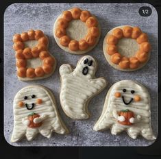 cookies decorated to look like ghostes and pumpkins