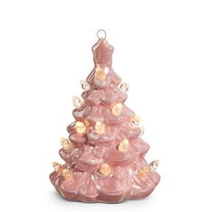 a pink ceramic christmas tree ornament with lights