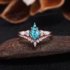 Unique Kite Turquoise Engagement Ring Set Vintage Rose Gold Blue Turquoise Bridal Rings Marquise Moissanite Wedding Band Rings For Women RING DESCRIPTION ✦Engagement Ring ✴Center Stone - Turquoise Shape - kite Cut Size - 6*9mm ✴Side Stones - Moissanite Shape - Round & Marquise Cut Weight - About 0.34ct ✴Band Width - About 1.6mm ✦Wedding band ✴Stone - Moissanite Shape - Round & Marquise Cut Weight - 0.114ct ✴Band Width - About 1.5mm ✴Ring Metal: Available in rose gold plated, yellow gold plated, Custom Turquoise Engagement Ring, Turquoise Kite Engagement Ring, Native Engagement Rings, Torquise Promise Rings, Turquoise Engagement Ring Vintage, Opal And Turquoise Engagement Ring, Engagement Ring Turquoise, Wedding Turquoise Ring With Diamond Accents, Blue Turquoise Ring With Diamond Accents For Wedding