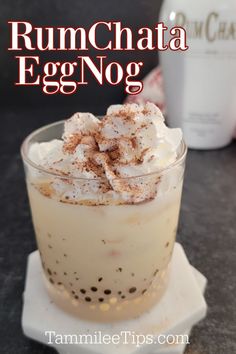 rumchata egg nog in a glass with whipped cream and cinnamon on top