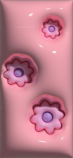 three pink flower shaped objects floating in the water on a pink surface with white and black lines