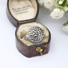 A lovely true vintage silver marcasite cluster boule ring. Stamped with a silver mark to the inside of the band. In really nice, true vintage condition. There is one small marcasite stone missing to one shoulder. Please see all the photos. UK Size - O 1/2 US Size - 7 1/2 Weight - 3.6 grams --------------------- All boxes in the photographs are for display purposes only, unless stated otherwise. Please be aware there will be marks and wear commensurate with age. Please see all of the photos. Feel Victorian Silver Cluster Ring With Single Cut Diamonds, Victorian Silver Cluster Ring With Rose Cut Diamonds, Silver Victorian Cluster Ring With Single Cut Diamonds, Antique Silver Diamond Ring Collectible, Antique Silver Diamond Ring, Antique Silver Cluster Rings, Vintage Silver Cluster Ring With Single Cut Diamonds, Antique Silver Cluster Diamond Ring, Vintage Sterling Silver Diamond Ring With Halo Setting