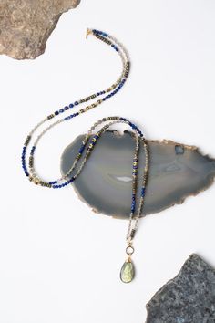 Blue Moon 32.5-34.5" Lapis With Labradorite And Pyrite Collage Necklac – Anne Vaughan Designs Bohemian Sapphire Necklaces With Natural Stones, Blue Gemstone Beads Jewelry For Layering, Blue Labradorite Gemstone Bead Necklaces, Gold Labradorite Crystal Necklace With Gemstone Beads, Gold Beaded Necklace With Labradorite Stones, Gold Labradorite Gemstone Beaded Necklace, Blue Labradorite Jewelry With Gemstone Beads, Gold Crystal Necklaces With Gemstone Beads, Blue Labradorite Gemstone Beads Jewelry