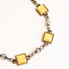 Silver Tone Yellow Square Charm Bracelet with Blue Beads Adjustable Preppy Chic Preppy Chic, Chic Shop, Blue Beads, Silver Tone, Charm Bracelet, Bracelet, Beads, Square