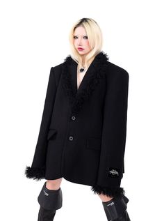 Classic oversized wool blazer in sleek black with luxurious faux fur trim on the collar and cuffs. Features a double-breasted design with button closure. Relaxed fit perfect for layering. Ideal for adding sophistication to winter outfits or creating a chic, androgynous look for formal occasions. Material Info60% polyester. 20% acrylic. 100% cotton. 20% viscose Model info Height: 160cm Weight: 43kg Wearing size: M Taobao Brands, Androgynous Look, Oversized Blazer, Oversized Silhouette, Black Suits, Wool Blazer, Black Blazers, Black Jacket, Fur Trim