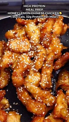 chicken wings with sesame seeds in a frying pan