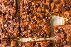 chocolate chip cookie bars cut into squares and arranged on top of each other