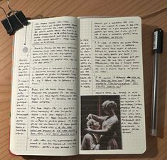 an open book with writing on it next to a pen