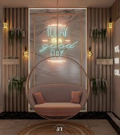 a living room with a round chair and neon sign on the wall above it that says today is a good day