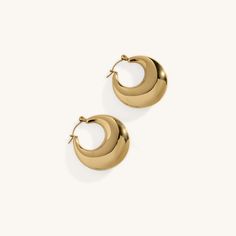 Introducing the Elena Earrings, a delicate and elegant addition to your jewelry collection. These earrings feature a timeless design, plated in radiant 18K gold. With their understated charm, they effortlessly complement any outfit, whether you're dressing up for a special occasion or keeping it casual. The Elena Earrings are the perfect choice for adding a touch of sophistication to your look. When you're not wearing this piece, tuck it away in your very own Milou jewellery box provided. Stainl Timeless Design, Special Occasion, Jewelry Box, 18k Gold, Jewelry Collection, Plating, Gold