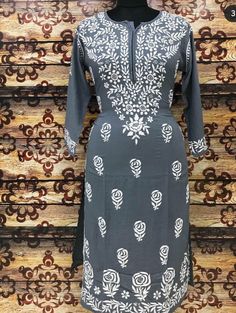 Length - 48 inches Touch and Feel - Comfortable and Soothing Delicate Chikan hand embroidery on the cotton fabric. This kurti is the epitome of class and beauty. Tailored in straight fit; the kurta features pretty 'Jaal' pattern embroidery on the whole front, Flair it up with Pants, pallazos and churidars along with matching flats. Disclaimer : Motifs of embroidery may vary as the images shown are for illustration purpose . We are dealing with needle craft which is GI mapped and recognized by Tr Tunic Kurti, Chikankari Kurta, Cotton Tunic, Pattern Embroidery, Pakistani Dress Design, White Embroidery, Beautiful Embroidery, Bollywood Fashion, Pakistani Dresses