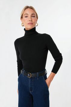 The Arlo Turtleneck Sweater is a classic layering piece that you’ll be wearing all season long, year after year. In a super comfy, stretch ribbed fabric, this fitted silhouette can be worn under a cardigan or tucked into your favorite denim. Style this versatile number under a blazer for a chic office outfit to give yo Classic Turtleneck Sweater With Ribbed Neckline, Fall Workwear Turtleneck With Ribbed Collar, Fall Turtleneck With Ribbed Collar For Work, Ribbed Collar Turtleneck For Fall Workwear, Fall Ribbed Collar Turtleneck For Work, Versatile Ribbed Turtleneck Tops, Ribbed Turtleneck Outerwear, Chic Ribbed Collar Turtleneck For Fall, Chic Fitted Sweater With Ribbed Neckline