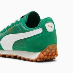 The PUMA Easy Rider was born in the late ‘70s, when running made its move from the track to the streets. Today, it makes its return for today’s wearers, with its classic slim profile and vintage vibes intact. This version, featuring a textile base with suede leather overlays, is sure to bring a touch of fun, retro-style to any look. Leather Working Group (LWG): PUMA’s leather products support responsible manufacturing via the Leather Working Group. www.leatherworkinggroup.com Nylon based upper Suede overlays on quarter, toe and vamp Nylon vamp Suede eyelet Suede heel with synthetic leather underlay Nylon tongue Synthetic leather PUMA Formstrip PUMA branding details PUMA Little Kids: Recommended for young kids between 4 and 8 years Green Puma Sneakers For Jogging, Retro Puma Sneakers For Sports, Casual Green Puma Sneakers, Puma Easy Rider, Sneakers Kids, Vintage Sneakers, Sneakers Puma, Easy Rider, Kids Sneakers