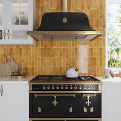 a stove top oven sitting inside of a kitchen next to a wall mounted range hood