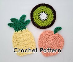 two crocheted pineapples are next to each other