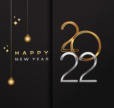 two new year's greeting cards with gold and silver numbers, hanging from strings