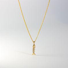 *The pendant COMES WITH the chain if you select one of our chain options *5% OFF TOTAL PRICE, when you purchase the chain and pendant combo (The price shown is after the discount) Cute and unique, you'll love this solid gold pendant as your unique gold pendant for casual day. Featuring a handmade and hand-polished fishbone, this 14K solid gold pendant is the perfect way to level up your day-to-day outfits. It's super casual yet unique and will make for a perfect conversation piece. Charlie & Co Unique Gold Pendant, Fishbone Necklace, Fish Bone Necklace, Bone Necklace, Bone Pendant, Statement Choker, Gold Copper, Beaded Choker Necklace, Vintage Orange