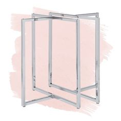 an open metal frame against a pink background